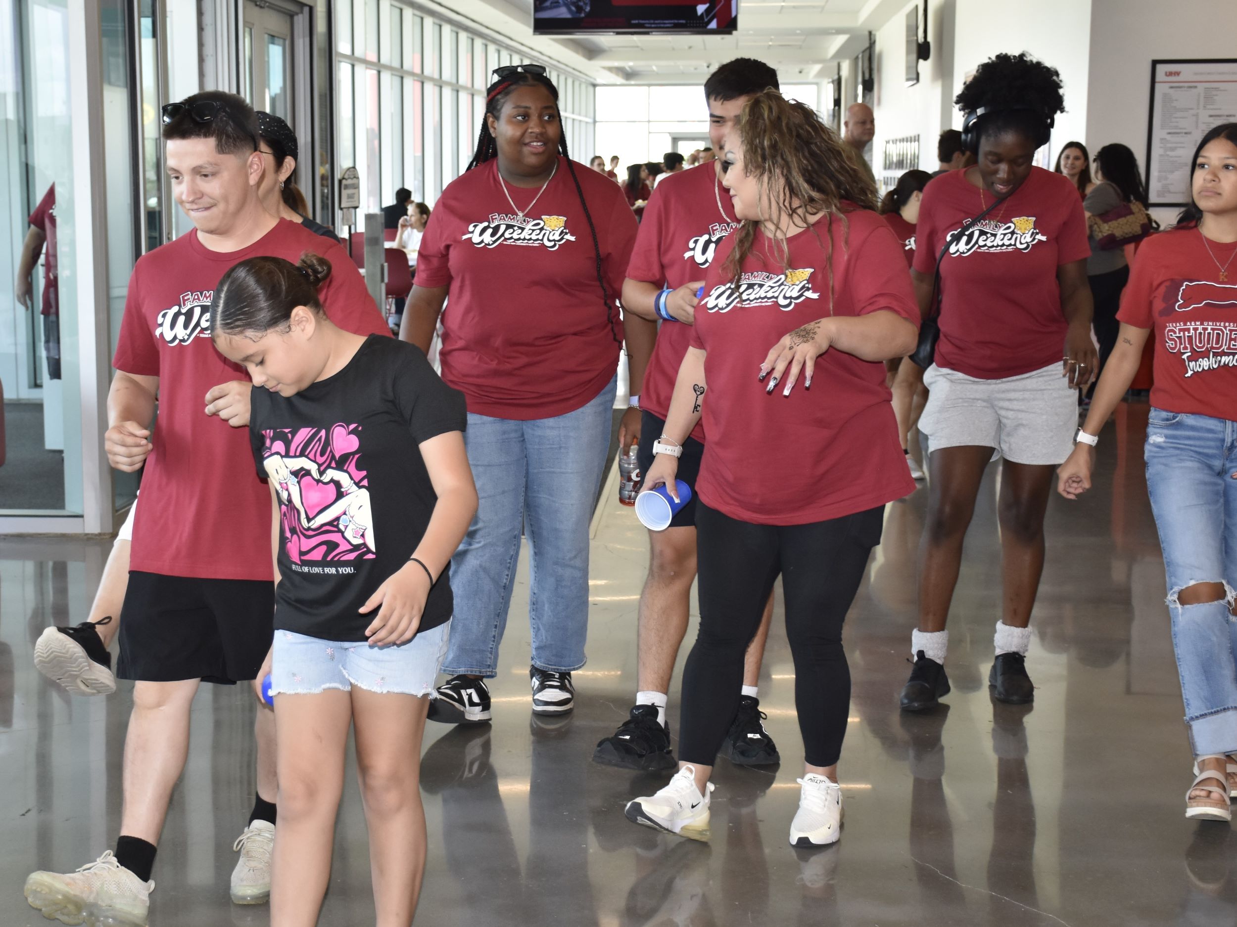 People do a line dance.