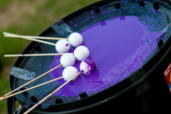 A dish of purple paint at splat event